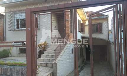 Casa com 3 quartos à venda na Rua Augusto Attílio Giordani, 174, São Sebastião, Porto Alegre por R$ 650.000