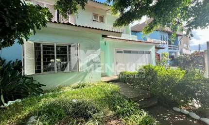 Casa com 3 quartos à venda na Rua Vitório Francisco Giordani, 210, Jardim Itu Sabará, Porto Alegre por R$ 980.000