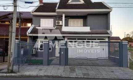 Casa com 3 quartos à venda na Rua Hugo Nelson Magalhães, 280, Parque Santa Fé, Porto Alegre por R$ 958.000