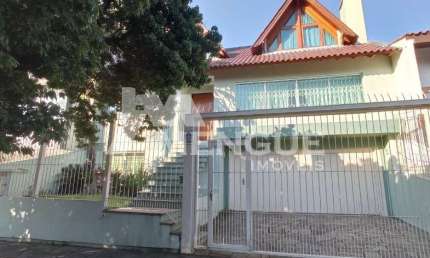 Casa com 5 quartos à venda na Rua Maestro Salvador Campanella, 46, Jardim Itu Sabará, Porto Alegre por R$ 1.500.000