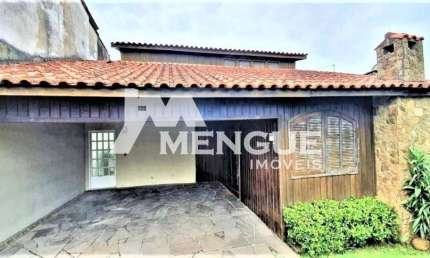 Casa com 6 quartos à venda na Rua Tenente Ary Tarrago, 2850, Jardim Itu Sabará, Porto Alegre por R$ 595.000