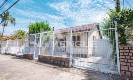 Casa com 3 quartos à venda na Rua Toroquá, 388, Passo da Areia, Porto Alegre por R$ 740.000