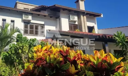 Casa com 4 quartos à venda na Rua Arnaldo Ballve, 709, Jardim Itu Sabará, Porto Alegre por R$ 1.280.000