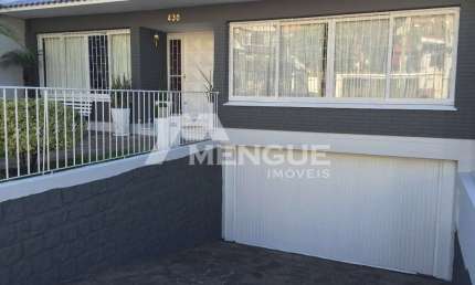 Casa com 5 quartos à venda na Avenida General Barreto Viana, 430, Chácara das Pedras, Porto Alegre por R$ 1.550.000