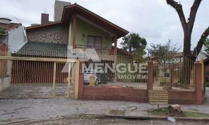 Casa com 5 quartos à venda na Rua Bogotá, 720, Jardim Lindóia, Porto Alegre por R$ 1.970.000