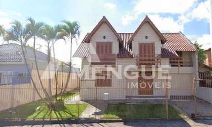Casa com 3 quartos à venda na Rua Zeferino Dias, 823, Sarandi, Porto Alegre por R$ 680.000