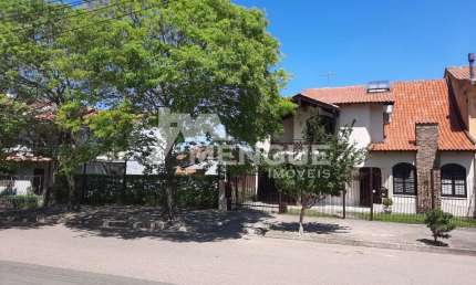 Casa com 5 quartos à venda na Rua Elias Bothome, 371, Jardim Itu Sabará, Porto Alegre por R$ 1.190.000