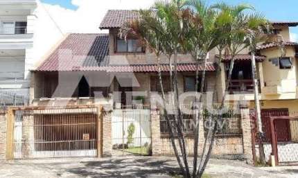 Casa com 5 quartos à venda na Rua Chafic João Scaf, 137, Jardim Itu Sabará, Porto Alegre por R$ 2.120.000