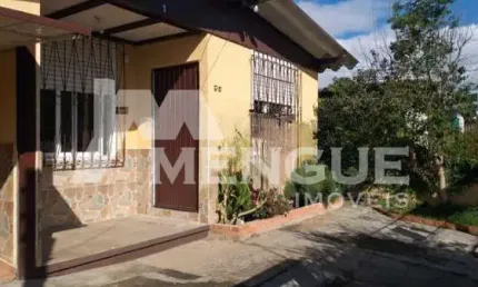 Casa com 3 quartos à venda na Rua Hermeto Bermudez, 95, Jardim Leopoldina, Porto Alegre por R$ 519.000