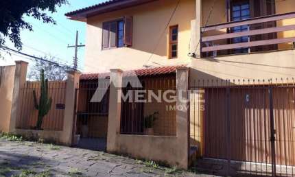 Casa com 3 quartos à venda na Rua Monte Flor, 68, Jardim Floresta, Porto Alegre por R$ 590.000