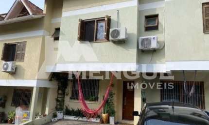 Casa em condomínio fechado com 3 quartos à venda na Rua Monte Flor, 276, Jardim Floresta, Porto Alegre por R$ 525.000