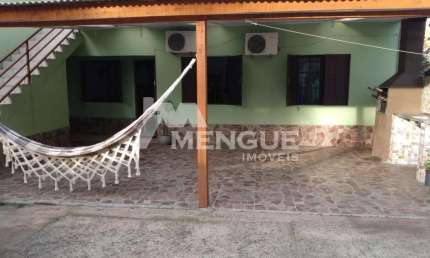 Casa em condomínio fechado com 3 quartos à venda na Rua Irene Capponi Santiago, 329, Cristo Redentor, Porto Alegre por R$ 265.000