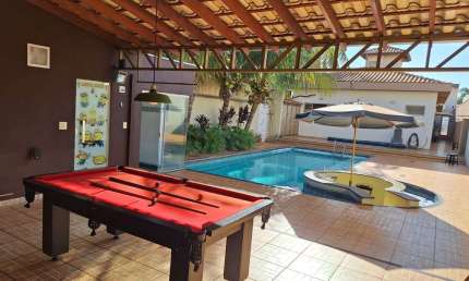 Casa com 3 quartos à venda no Jardim Anhangüera, Ribeirão Preto  por R$ 1.060.000