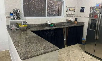 Casa com 3 dormitórios à venda, 118 m² por R$ 690.000,00 - Canto do Forte - Praia Grande/SP