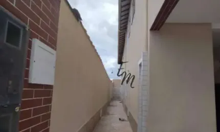 Casa com 2 dormitórios à venda, 60 m² por R$ 300.000,00 - Caiçara - Praia Grande/SP
