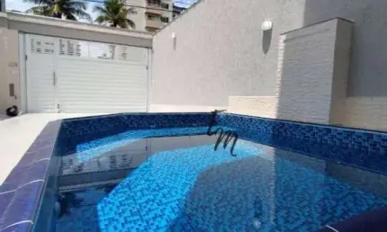 Sobrado com 3 dormitórios à venda, 120 m² por R$ 720.000,00 - Vila Assunção - Praia Grande/SP