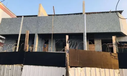 Sobrado com 3 dormitórios à venda, 179 m² por R$ 830.000,00 - Vila Guilhermina - Praia Grande/SP
