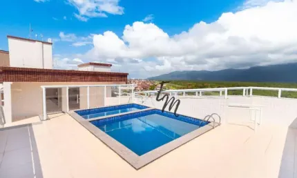 Apartamento com 2 dormitórios à venda, 57 m² por R$ 280.000,00 - Caiçara - Praia Grande/SP
