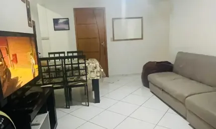 Apartamento com 2 dormitórios à venda, 70 m² por R$ 410.000 - Vila Guilhermina - Praia Grande/SP