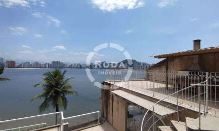 Casa de Alto Padrão Frente Mar no Parque Prainha, São Vicente – Luxo e Exclusividade