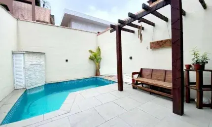 Sobrado triplex com 4 dormitórios, piscina e churrasqueira na aparecida – santos/sp