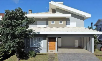 Casa à venda em condomínio horizontal, com 4 suítes, piscina e espaço gourmet, Campeche, Florianópo