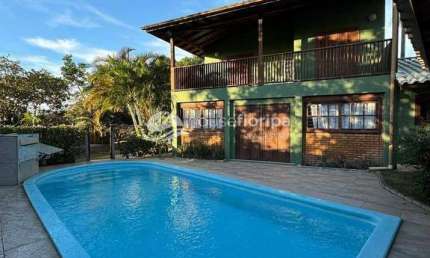 Casa com 4 quartos, churrasqueira, espaço gourmet  e piscina perto da praia Campeche à venda, Rio T