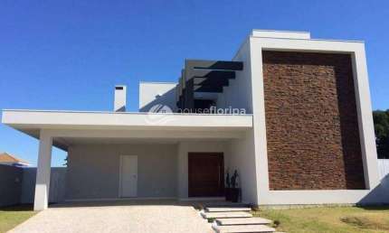 Casa de alto padrão à venda com 4 suítes em condomínio, no Campeche, Florianópolis, SC