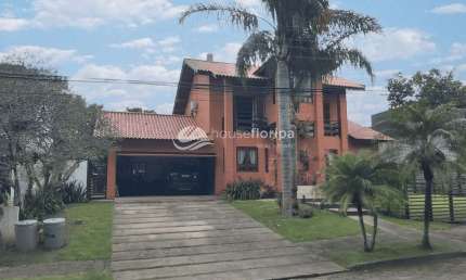 Casa à venda em condomínio fechado, com 4 dormitórios, piscina, Rio Tavares, Florianópolis, SC