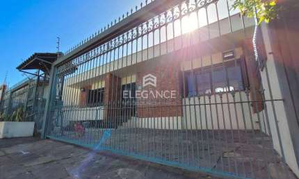 Elegance Imóveis vende casa com 4 dormitórios 318m2 2 vagas de garagem lareira piscina Três Figueiras Porto Alegre