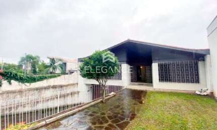 Elegance Imóveis vende casa residencial comercial  5 dormitórios 4 banheiros 4 vagas box garagem. Três Figueiras Porto Alegre. Comprar R$ 1.480.000.00