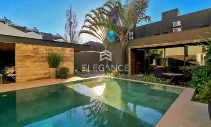 Elegance imóveis vende casa de cinema, 400m, 3 dormitórios, 3 suítes, churrasqueira, piscina aquecida, 6 vagas de garagem/box. Comprar R$ 4.989.000,00