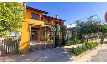 Casa com 4 quartos à venda na Rua Coronel Jaime da Costa Pereira, 340, Partenon, Porto Alegre por R$ 1.090.000