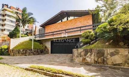 Casa com 4 quartos à venda na Travessa Java, 76, Jardim Lindóia, Porto Alegre por R$ 1.095.000