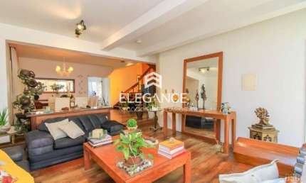 Elegance Imóveis vende casa 600m2 com 4 dormitórios 4 vagas de garagem  Chácara das Pedras Porto Alegre