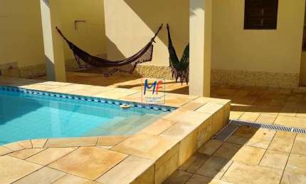 Excelente casa térrea em Itanhaém/SP, com 240m² a.u., 3 dormitórios (1 suíte), 3 salas, cozinha, churrasqueira, edícula, piscina, 6 vagas (REF 19.944)