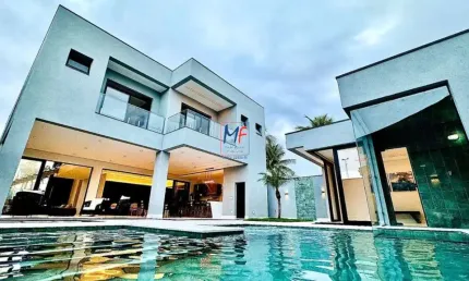Excelente Casa no Condomínio JD. Acapulco , mobiliado , com 525 m²  a.c., 5 dorms., (sendo 5 suítes), 7 banheiros, totalmente mobiliada, 4 vagas de garagem. REF: 19.984