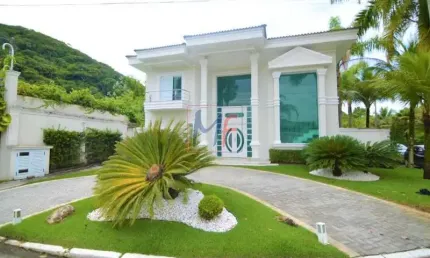 Excelente Casa em condomínio fechado no bairro Balneário Praia do Pernambuco - Guarujá, sendo 5 suítes, 5 vagas, 489 m². REF: 13.286