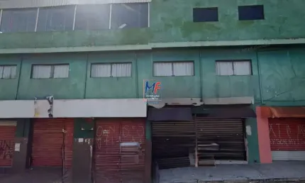 Excelente terreno Jardim Silva Teles, com 750m² a.u., terreno 286 m2,  composto por 3 casas, 5 comércios, um salão festas e 3 vagas. Prox. Av. Marechal Tito (REF 19.856)