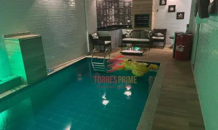 Casa com 3 dormitórios à venda, 157 m² por R$ 2.440.000,00 - Ponta da Praia - Santos/SP