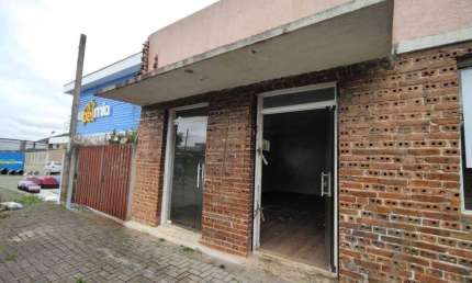 Imóvel Comercial de 100m² para Alugar no Juvevê, Curitiba: Terreno Amplo de 616m² com Estacionamento