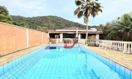 Casa com 3 dormitórios à venda, 310 m² por R$ 1.400.000,00 - Guaiuba - Guarujá/SP
