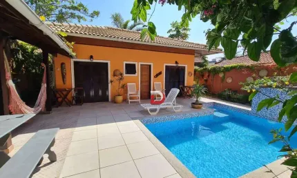 Sobrado com 5 dormitórios à venda, 193 m² por R$ 1.900.000,00 - Tombo - Guarujá/SP