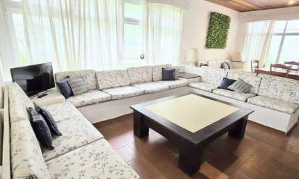 Casa com 3 dormitórios à venda, 182 m² por R$ 1.350.000,00 - Astúrias - Guarujá/SP