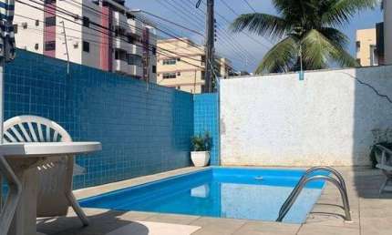 Sobrado com 2 dormitórios para alugar, 70 m² por R$ 2.600,00/mês - Astúrias - Guarujá/SP