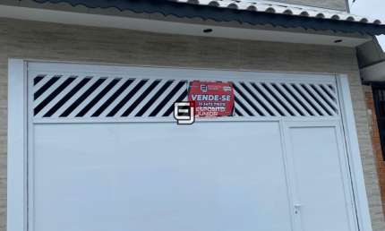 Casa com 2 dormitórios à venda, 120 m² por R$ 520.000