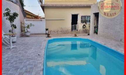 Sobrado com 4 dormitórios à venda, 235 m² por R$ 1.400.000,00 - Maracanã - Praia Grande/SP