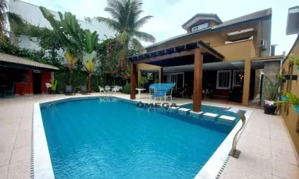 Casa com 5 dormitórios à venda, 430 m² por R$ 2.800.000,00 - Jardim Acapulco - Guarujá/SP