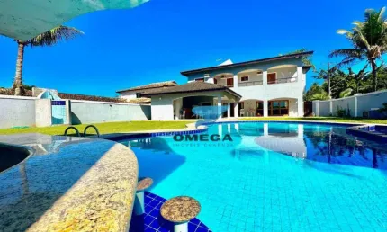 Casa reformada com 5 Suítes à venda no Jd. Acapulco em Guarujá.