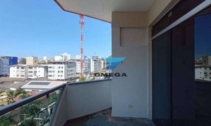 Apartamento com sacada - 3 quartos - 1 vaga de garagem à venda na praia das Astúrias - Guarujá/SP